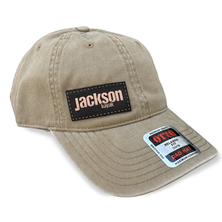 light brown low profile hat with dark brown jackson kayak leather patch logo, front