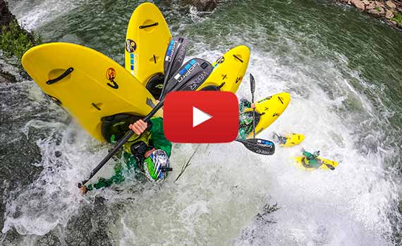 person going off a large waterfall in an antix 2.0 kayak