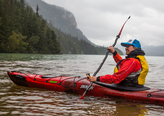 Happy kayaker in a Journey limited release Jackson Kayak