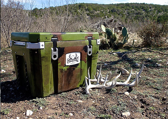 orion cooler in the high desert with an antler on it