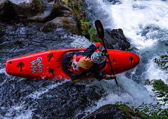 Paddler in whitewater in the jackson kayak gnarvana