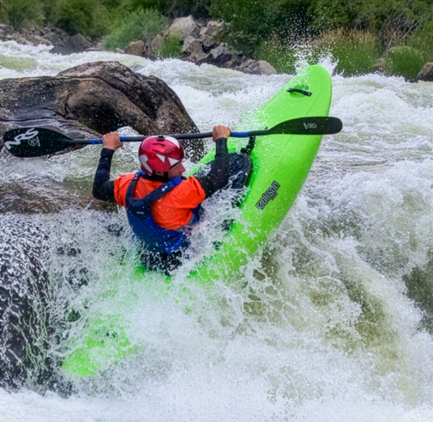 paddler doing a stern squirt in the new antix 3.0