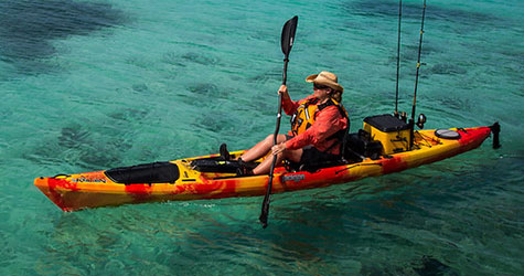 Person kayaking in ocean for mobile screens.