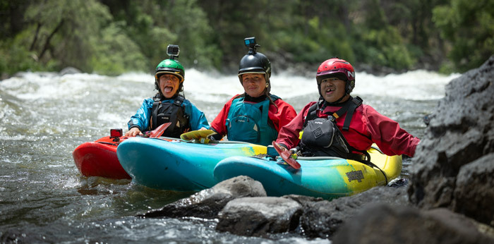 three paddlers in their Jackson Kayaks on the Klamath river First Descent