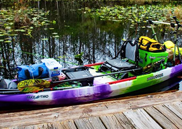 taketwo kayak loaded down with gear for an expedition