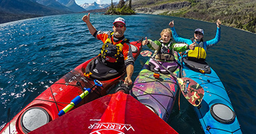 happy family paddling Jackson Kayak Journey kayaks